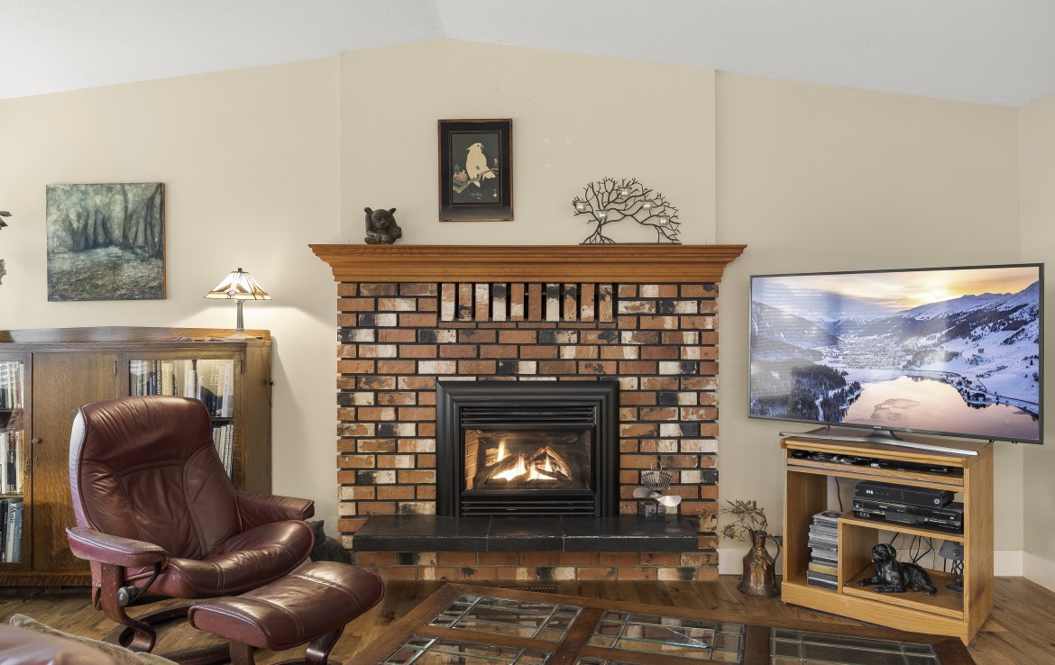 Living room straight on view of fireplace, Blairgowrie, Nanaimo, BC