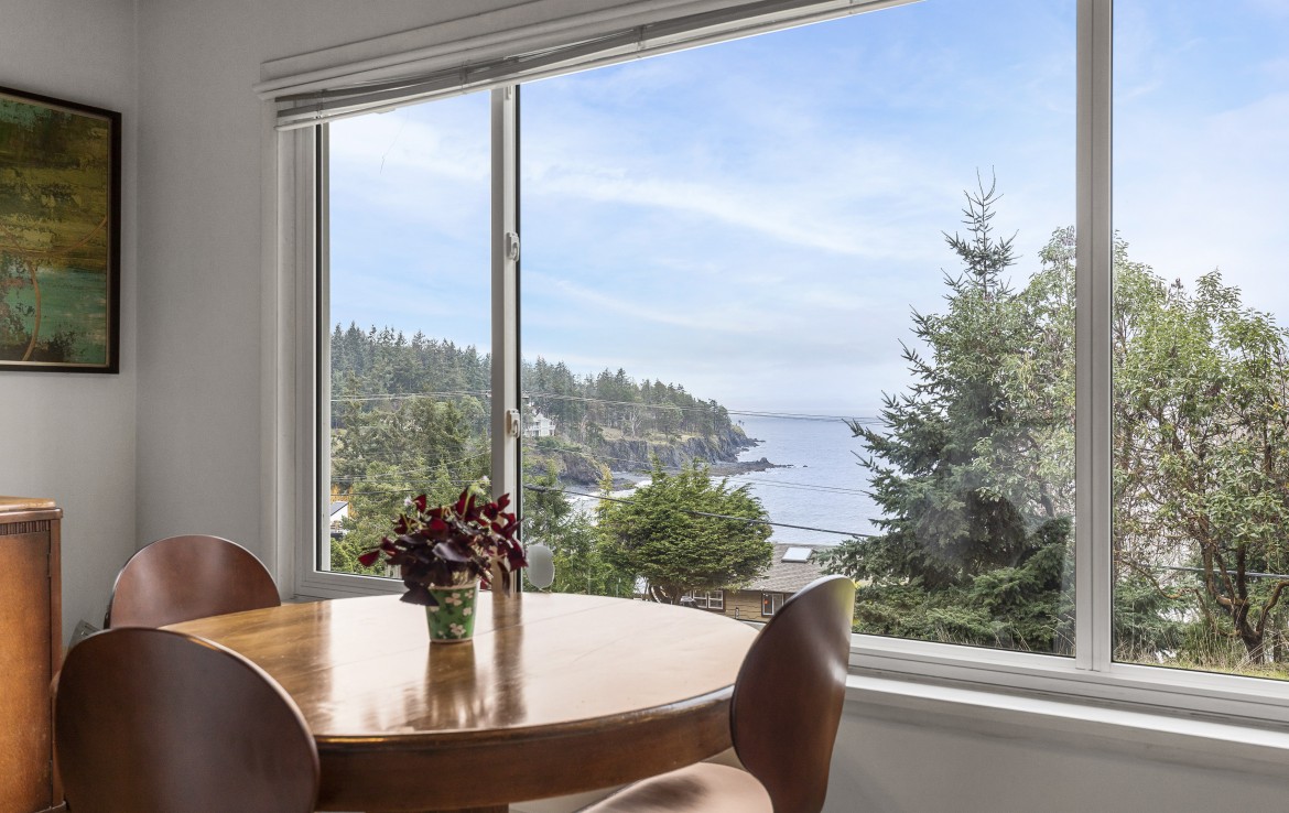 Close up view of the beautiful view of Nanoose Bay beach from the dining space.