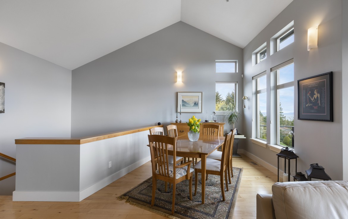 Dining space with vaulted ceilings in North Nanaimo Townhouse