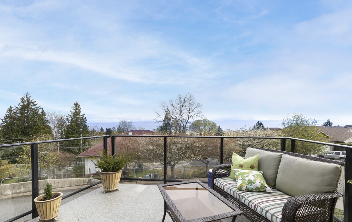 View of Ocean and Mountains from Deck of North Nanaimo Townhouse
