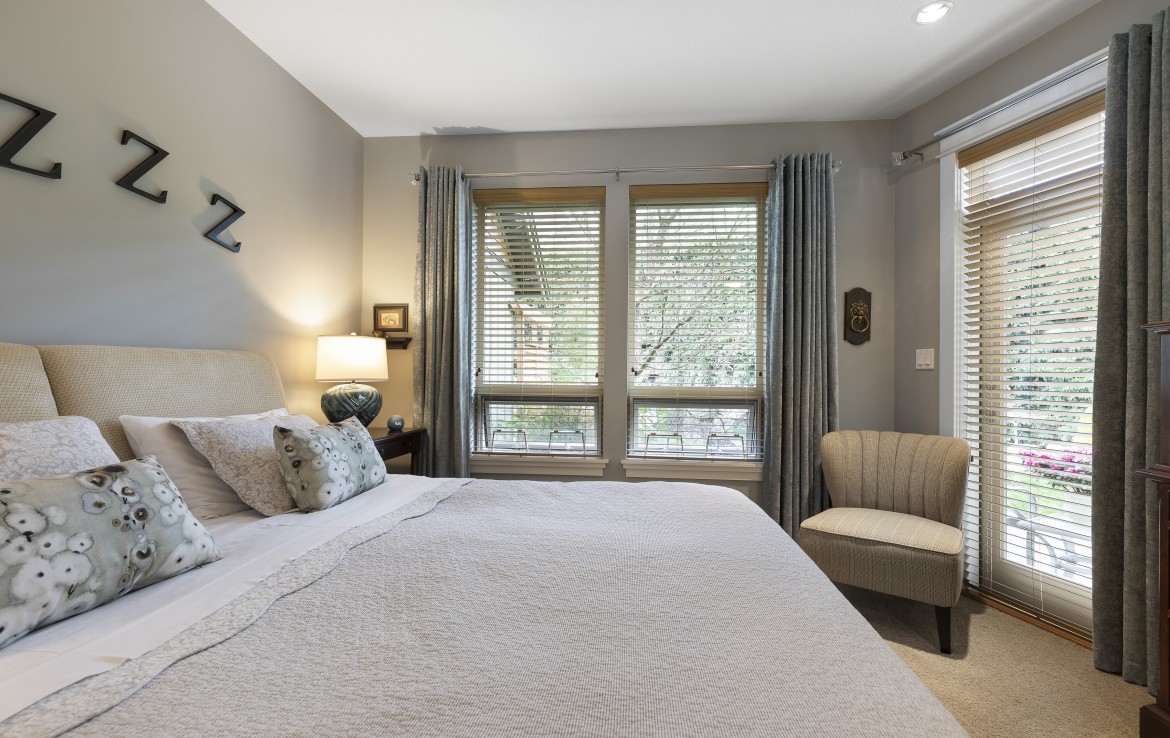 Primary Master Bedroom with outside access to private patio of North Nanaimo Townhouse