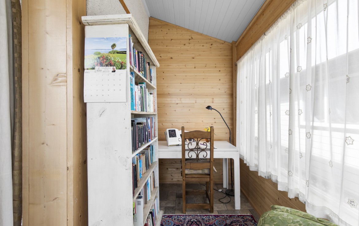 View to a reading area, in Sunroom, Character House